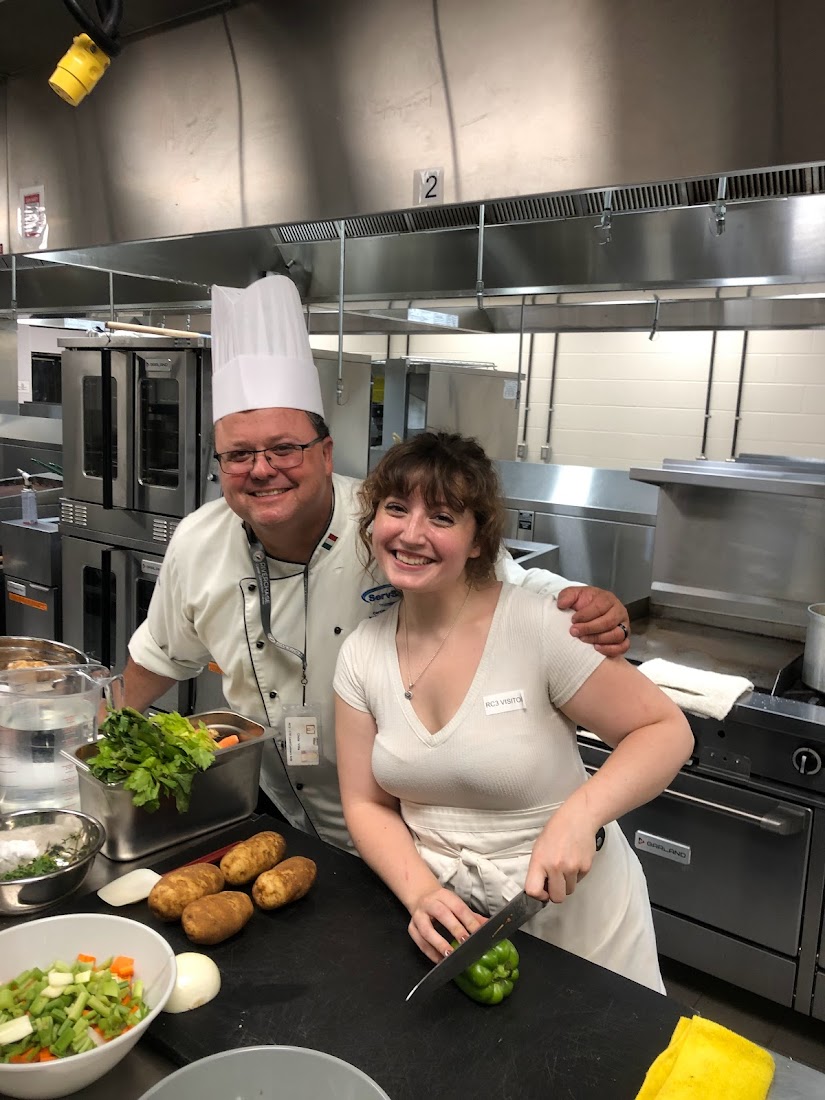 Chef Chris 'Bub' Villa in chef coat and toque in commercial kitchen